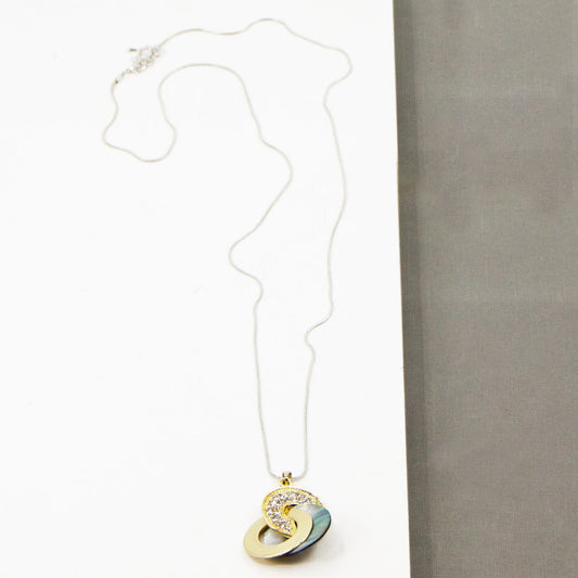 Long necklace with crystal encrusted link & mother of pearl disc